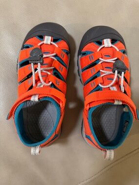 Keen Kids Newport H2 Sandals in the Safety Orange/Fjord Blue colorway